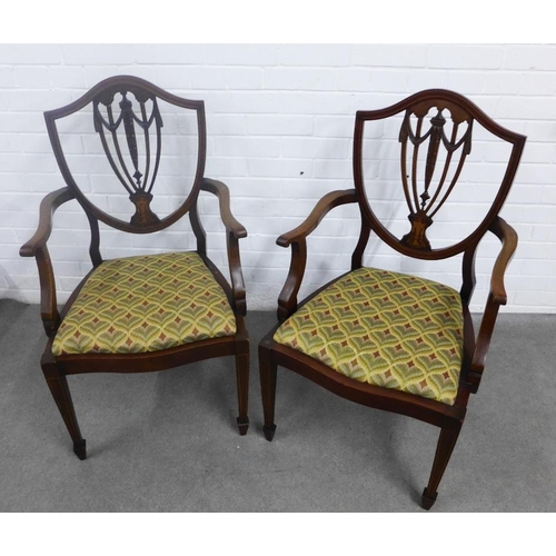 373 - A pair of Hepplewhite style mahogany open armchairs, inlaid shield backs with an urn motif, upholste... 