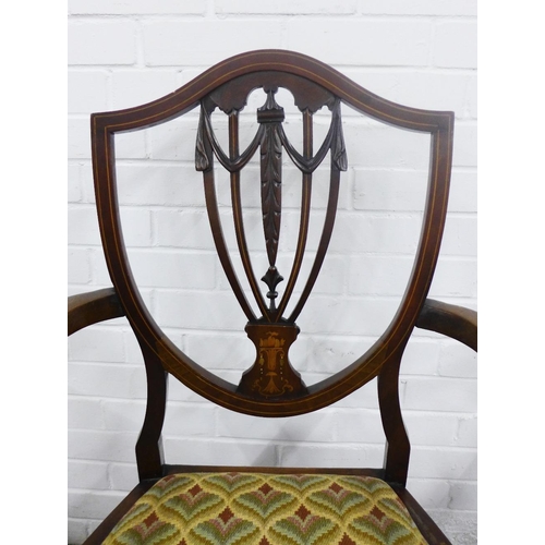 373 - A pair of Hepplewhite style mahogany open armchairs, inlaid shield backs with an urn motif, upholste... 