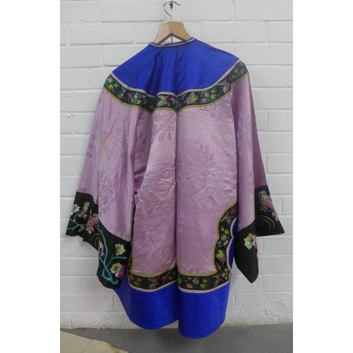 384 - A collection of Chinese embroidered clothing to include a jacket and three wraps / skirts(4)