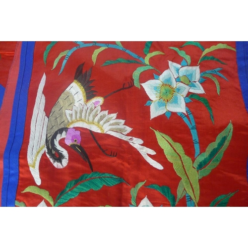 384 - A collection of Chinese embroidered clothing to include a jacket and three wraps / skirts(4)