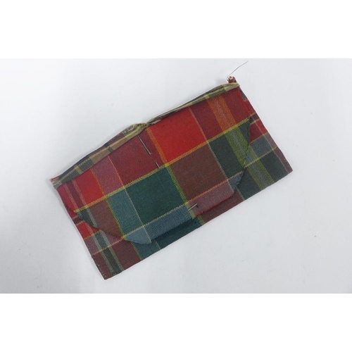 391 - Jacobite Interest, a tartan pouch, accompanied by a hand written note, 'This pocket book belonged to... 