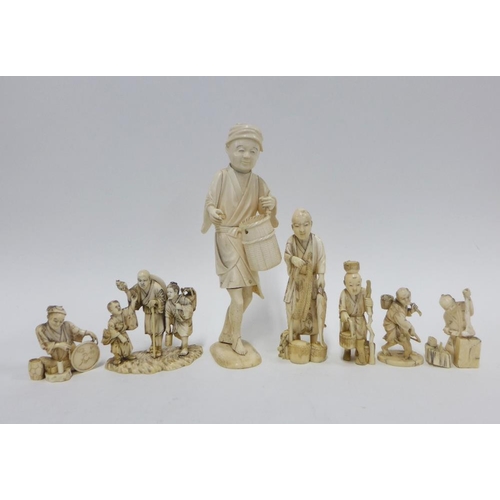 398 - A group of seven  Japanese ivory okimono figures, tallest 20cm (5)