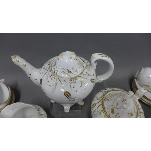 408 - 19th century English porcelain part teaset, white glazed with gilt pattern (a/f)