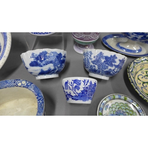 423 - Collection of blue and white pottery and porcelain to include two Chinese tea bowls and Staffordshir... 