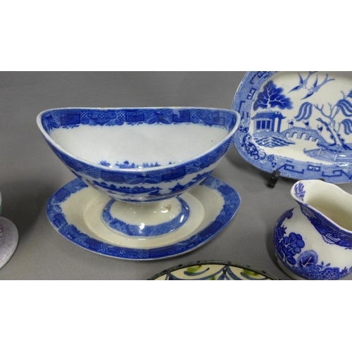 423 - Collection of blue and white pottery and porcelain to include two Chinese tea bowls and Staffordshir... 