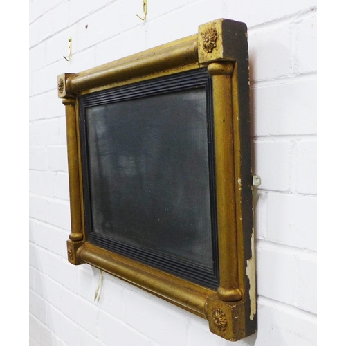 426 - Giltwood wall mirror with an ebonised slip and rectangular mercury glass plate, 58 x 42cm