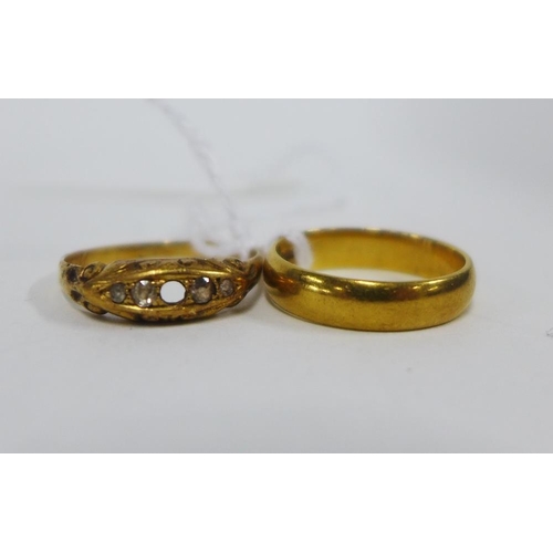 27 - 18ct gold wedding band, gold and diamond ring - one stone lacking and hallmarks rubbed, and a strand... 