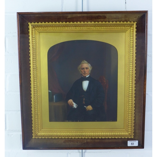 83 - 19th century rosewood frame containing an over painted photograph of a seated gent, size overall 45 ... 