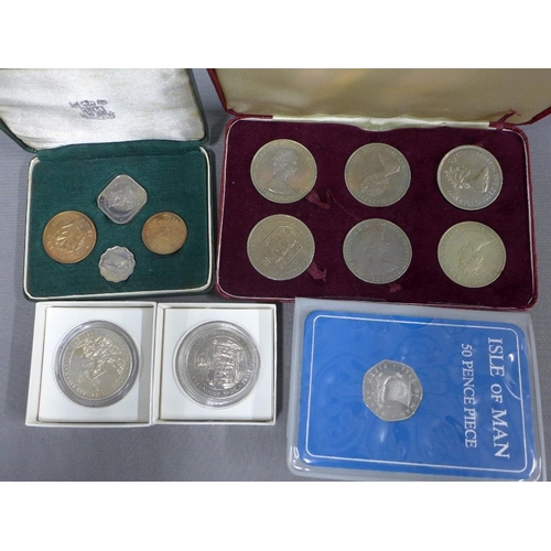 56 - A collection of Guernsey & Isle of Man commemorative coins (a lot)