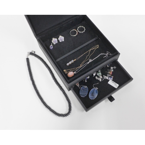 15 - Rocks & Co jewellery box containing a quantity of silver gemset earrings, amber dress ring and penda... 