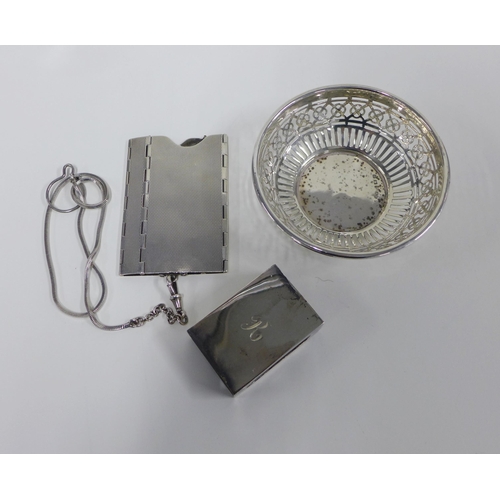 30 - George V silver bonbon dish, Birmingham 1911, two silver napkin rings, miniature silver bottle stamp... 