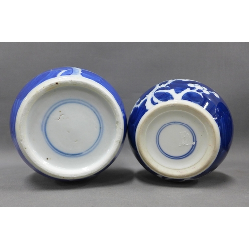 101 - Three blue and white Prunus pattern ginger jars with covers, tallest 19cm (3)