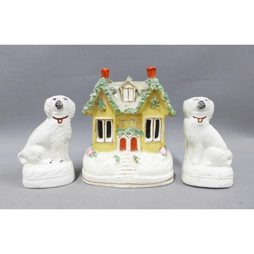 103 - Staffordshire cottage pastille burner and pair of miniature chimney spaniels, (3) tallest 14cm