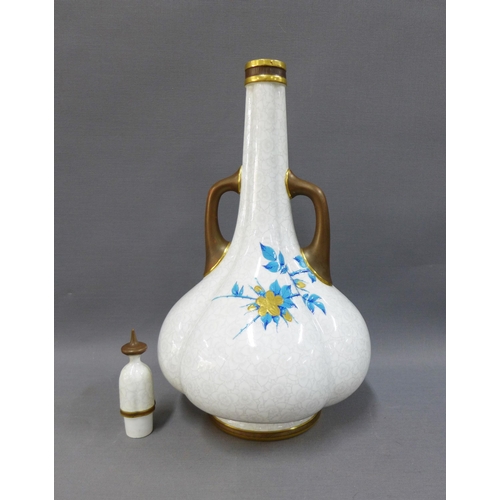 107 - Royal Worcester lobbed vase and cover, with side handles, painted with gilded flowers and turquoise ... 