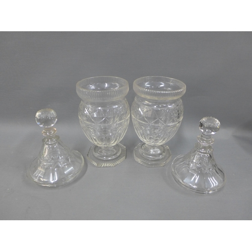 114 - A pair of Georgian glass confitures with covers, on octagonal bases, 33cm (2)