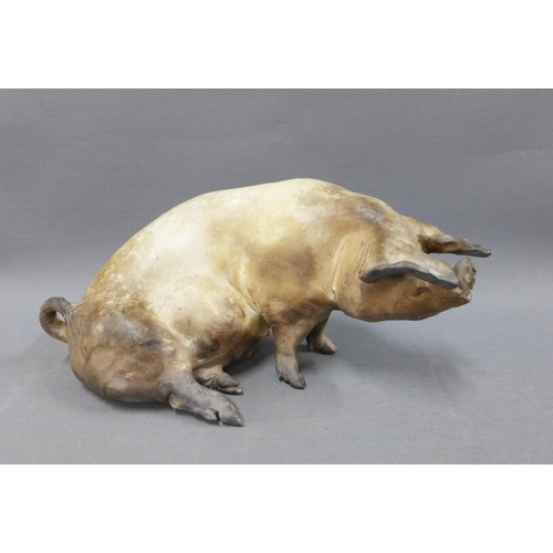 115 - Raku fired pig, signed indistinctly and dated 2001, 25cm