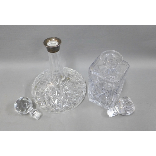 124 - Ships cut glass decanter and stopper with silver collar, together with a square cut crystal spirit d... 