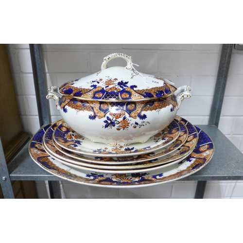 126 - Stoke Pottery Venice pattern dinner service with plates, bowels, serving platters, tureens and sauce... 