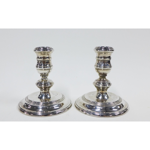 20 - Pair of silver desk candlesticks, London 1965, 11cm high, weighted base, (2)