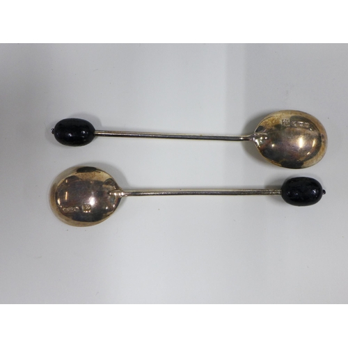 31 - Set of twelve silver coffee bean handled spoons, Sheffield 1960, in a fitted box, (12)