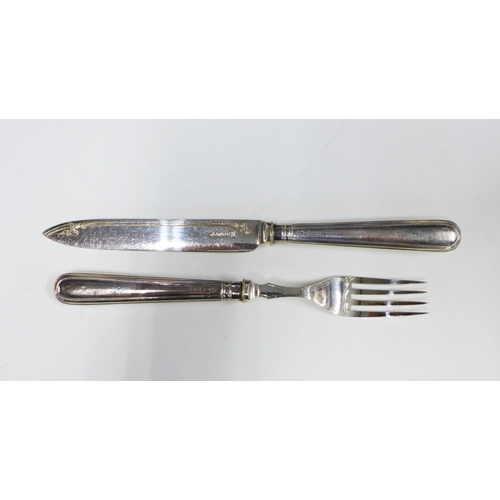 35 - Edwardian canteen of six fruit knives and forks with silver handles, Sheffield 1904 (12)