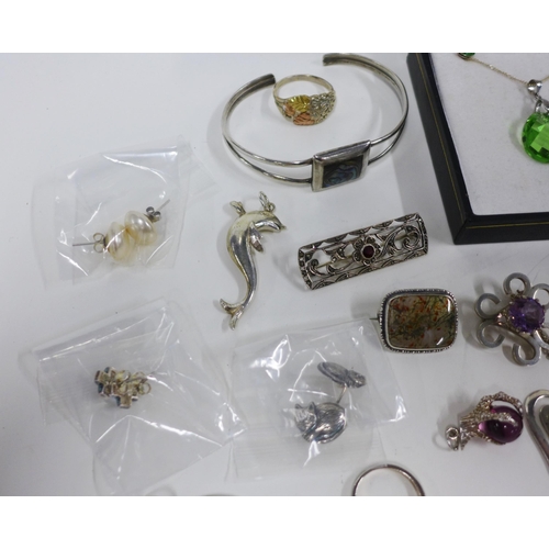 55 - Collection of silver jewellery to include a necklace, earrings, pendants and rings, etc (a lot)...