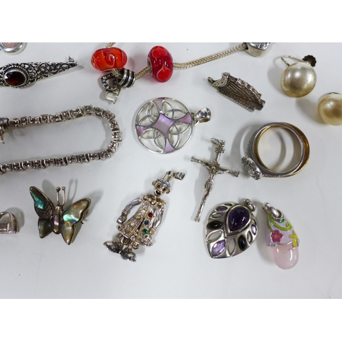 56 - Collection of silver jewellery to include a necklace, earrings, pendants, brooches and rings, etc (a...