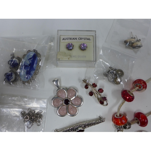 56 - Collection of silver jewellery to include a necklace, earrings, pendants, brooches and rings, etc (a...