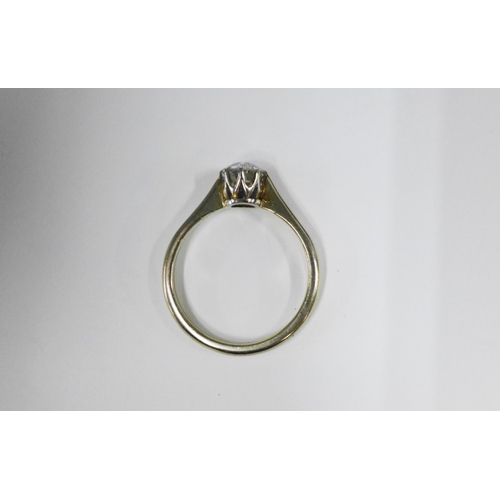 72 - Solitaire diamond ring, claw set with a single old round cut diamond to a plain white metal band, un... 