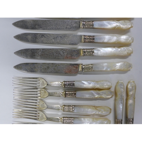 74a - A set of mother of pearl handled fruit knives and forks (a lot)