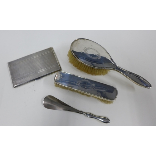 77a - Silver cigarette case, Chester 1946, Birmingham silver backed hair brush, clothes brush and a silver... 