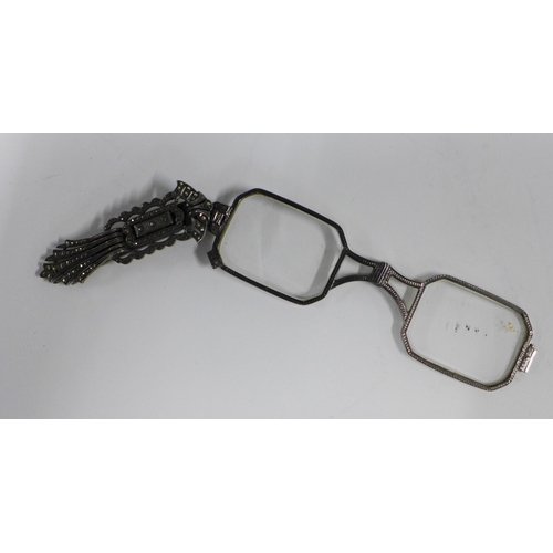 78a - Early 20th century marcasite lunettes and a pair of yellow metal lunettes , (2)