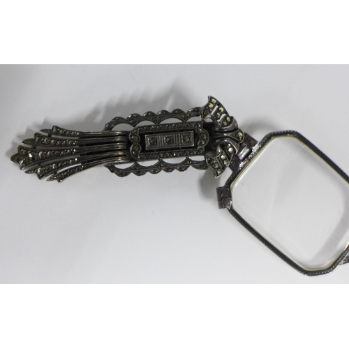 78a - Early 20th century marcasite lunettes and a pair of yellow metal lunettes , (2)