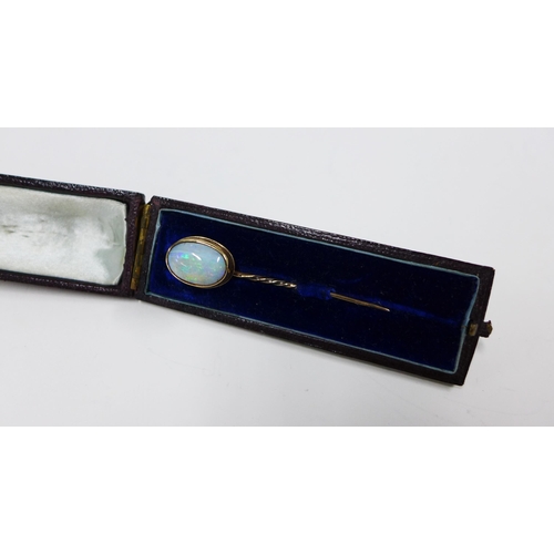 80 - Late 19th / early 20th century Gents tiepin with a large oval opal set to an unmarked yellow metal f... 