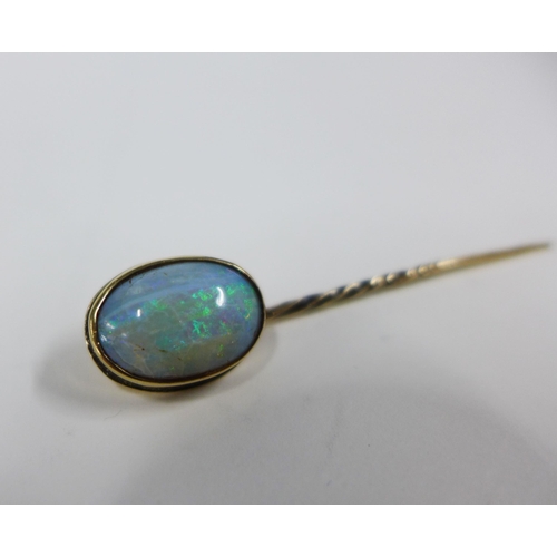 80 - Late 19th / early 20th century Gents tiepin with a large oval opal set to an unmarked yellow metal f... 