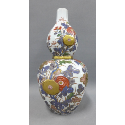 82A - Japanese double gourd vase of octagonal form, double walled with pierced chrysanthemum panels and pa... 