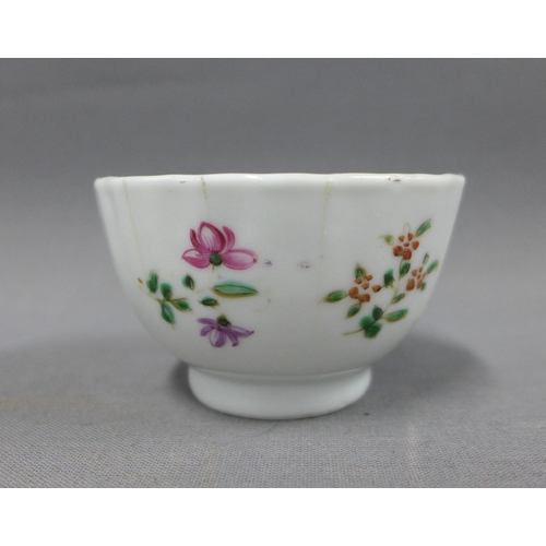 84 - Chinese cafe au lait blue and white glazed tea bowl and saucer (chip to saucer) and a famille rose t... 