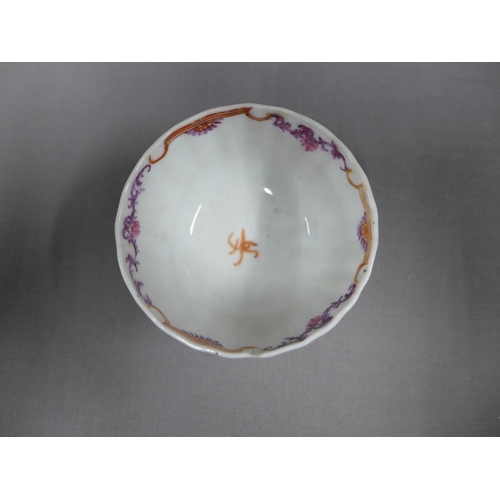 84 - Chinese cafe au lait blue and white glazed tea bowl and saucer (chip to saucer) and a famille rose t... 