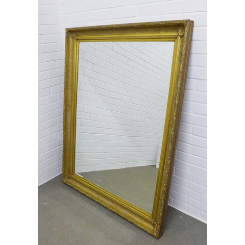 345 - Gilt framed wall mirror with rectangular bevelled glass plate, 113 x 140cm