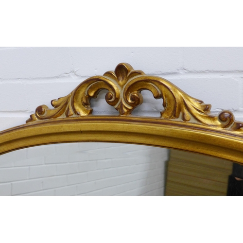 347 - Giltwood overmantle, scroll carved top and bevelled glass plate, 144 x 105cm