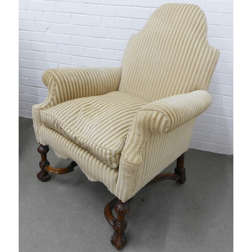 202 - A pair of Carolean style walnut cream upholstered armchairs with serpentine padded backs, scroll arm... 