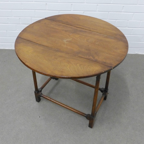 204 - 19th century mahogany drop leaf table. 57 x 65 x 66