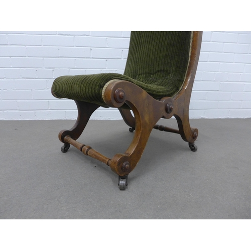 210 - Mahogany framed nursing chair with green upholstery. 68 x 39 x 34