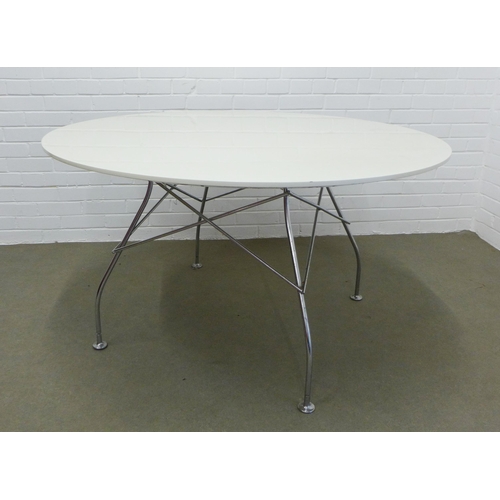 213 - Kartell  table with  circular gloss top on chrome metal legs. 71 x 129.