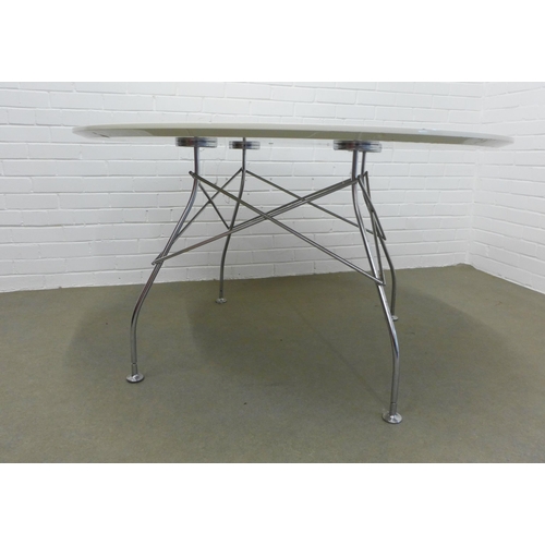 213 - Kartell  table with  circular gloss top on chrome metal legs. 71 x 129.