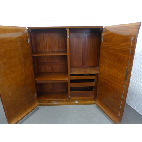 221 - French Art Deco walnut armoire by Roger Bal, Paris, with stylised curve doors and silvered handles, ... 