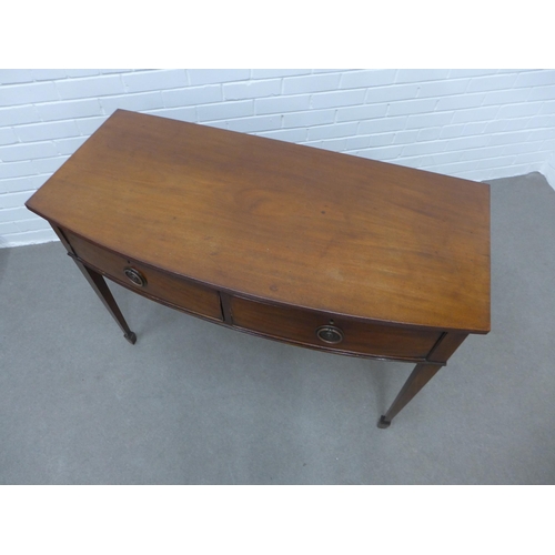 224 - Mahogany bow front side table with two short drawers, tapering legs and spade feet,  78 x 110 x 51