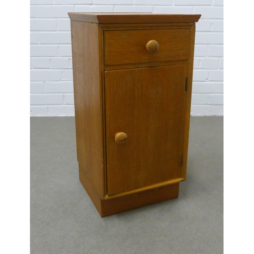 229 - Vintage Meredew light oak cabinet, single drawer above cupboard door. 66 x 33 x 32.