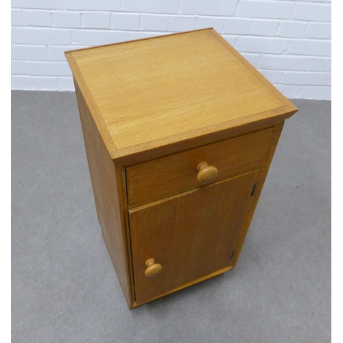 229 - Vintage Meredew light oak cabinet, single drawer above cupboard door. 66 x 33 x 32.