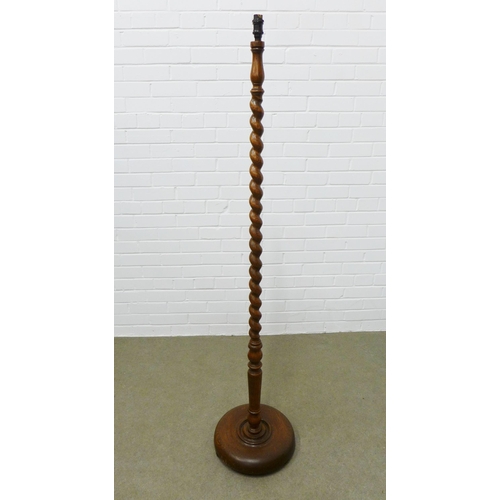 234 - Oak barley twist standard lamp. Height is 161cm.